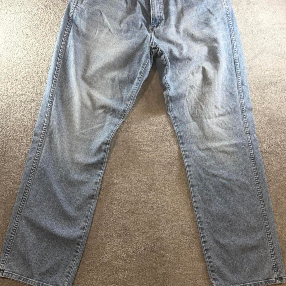 Men's Wrangler jeans in a light wash blue denim 36x32